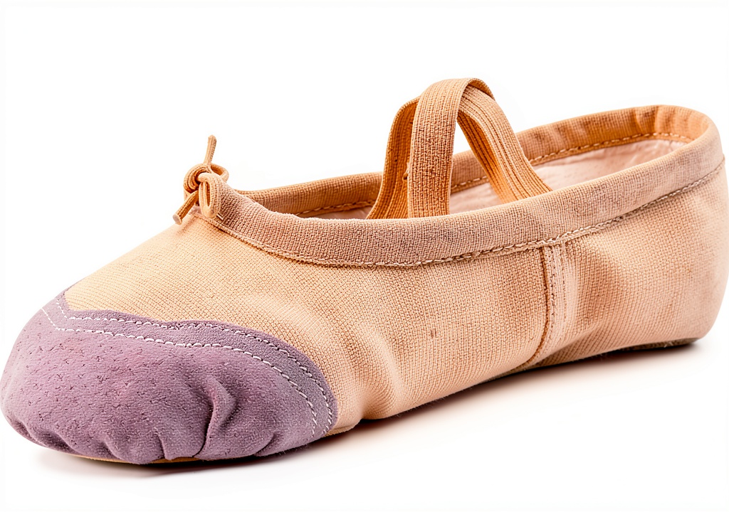 'Girls ballet shoes in pink and black colors displayed on a dance floor'